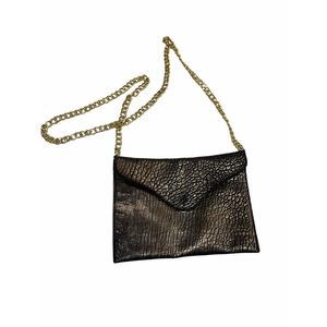 jj Winter’s crossbody gold link bag
